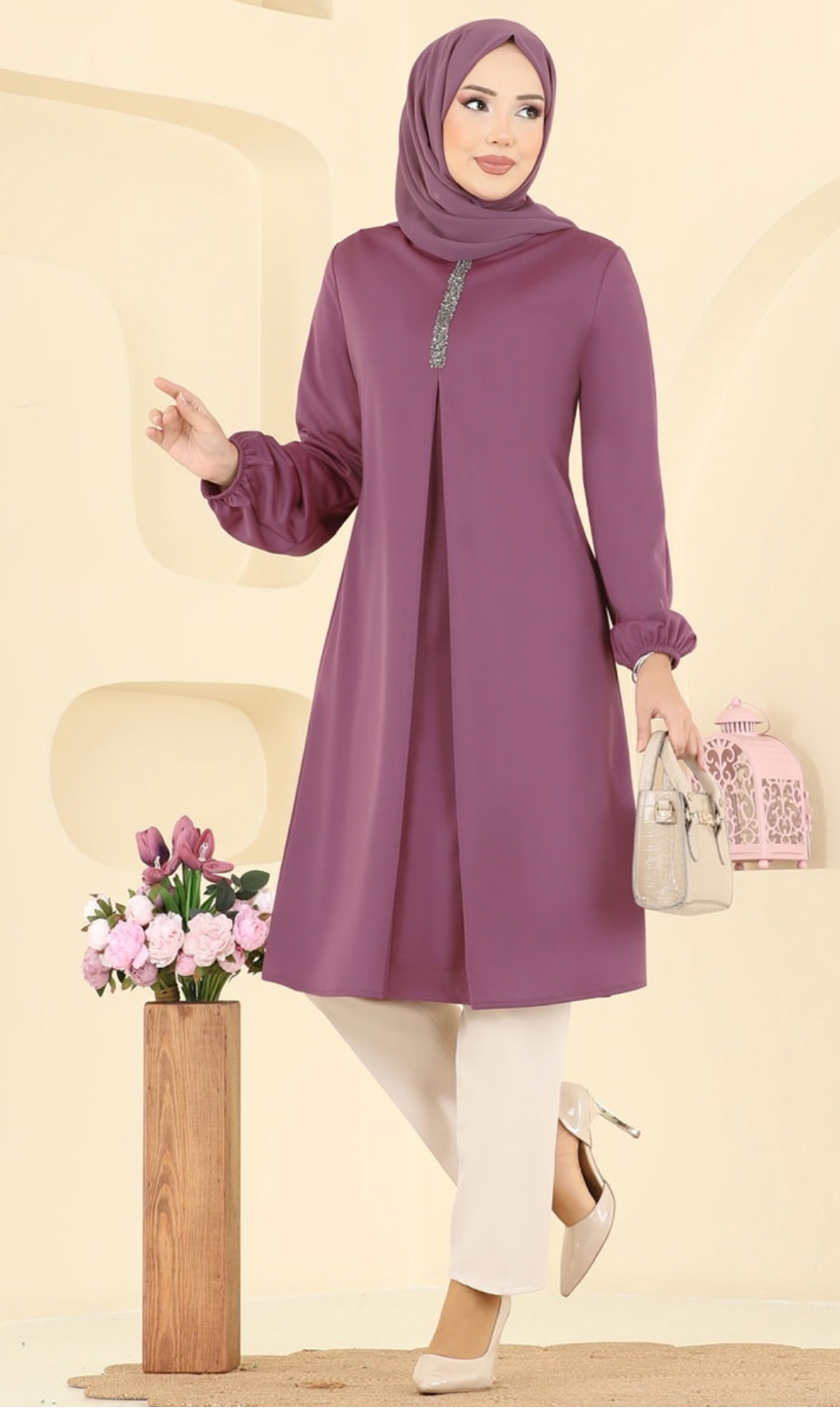 بلوزة طويلة باللون الوردي للمحجبات