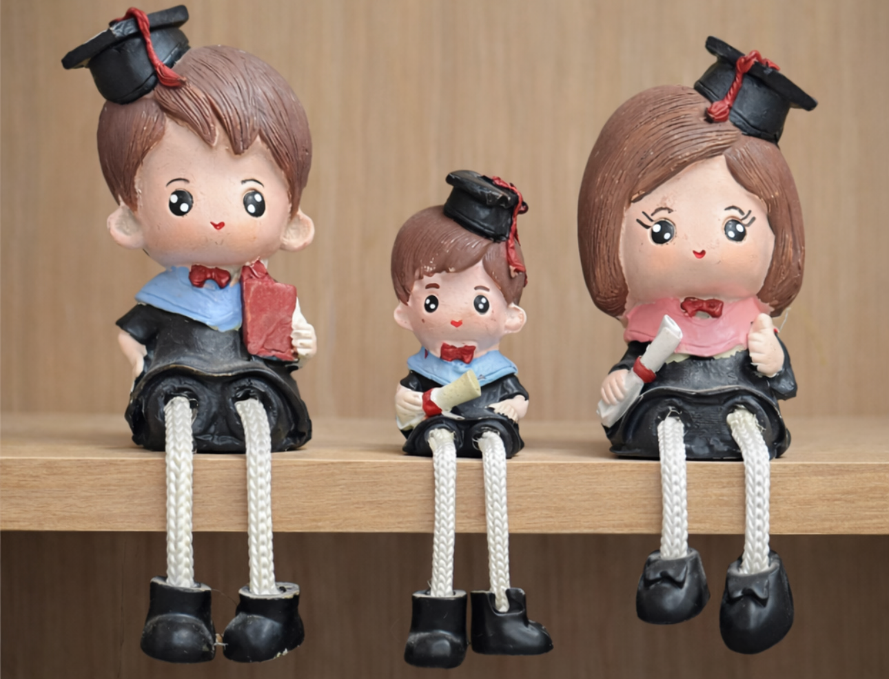 مجسمات فخّار بتصميم عائلة بمناسبة التخرج